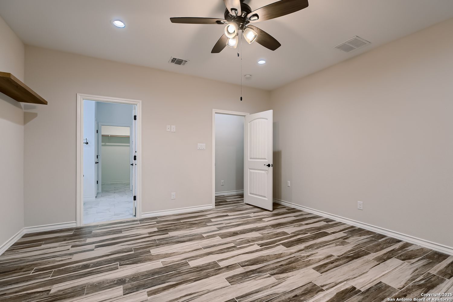 3963 Summit Hurst New Braunfels, TX 78132 - Photo 13 of 28 a view of a room with a ceiling fan