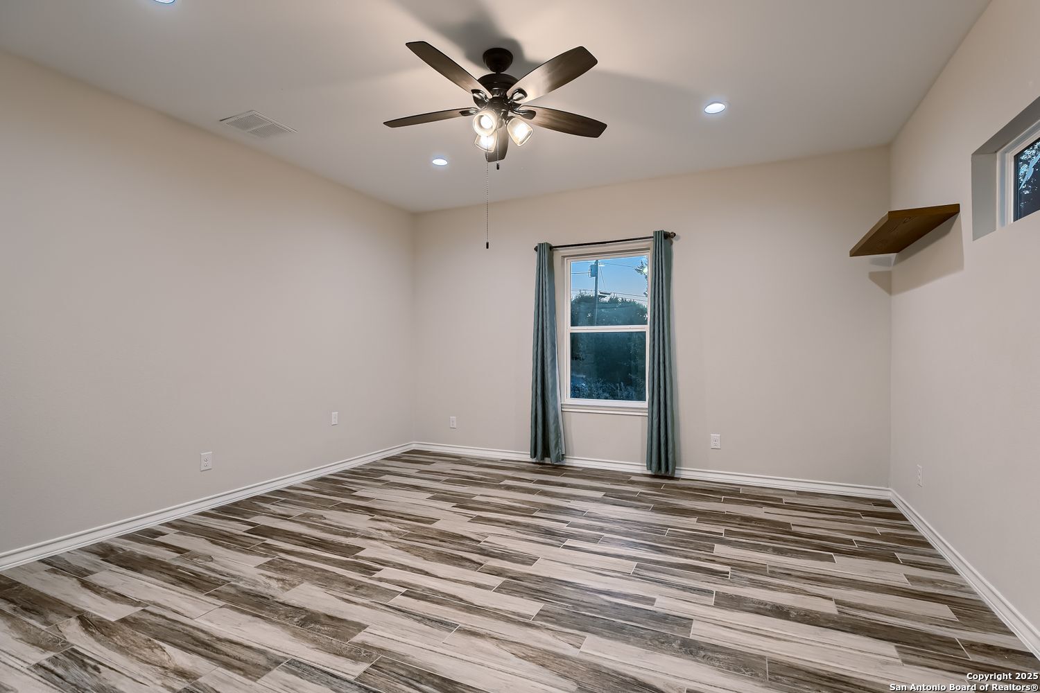 3963 Summit Hurst New Braunfels, TX 78132 - Photo 15 of 28 a view of an empty room with a balcony