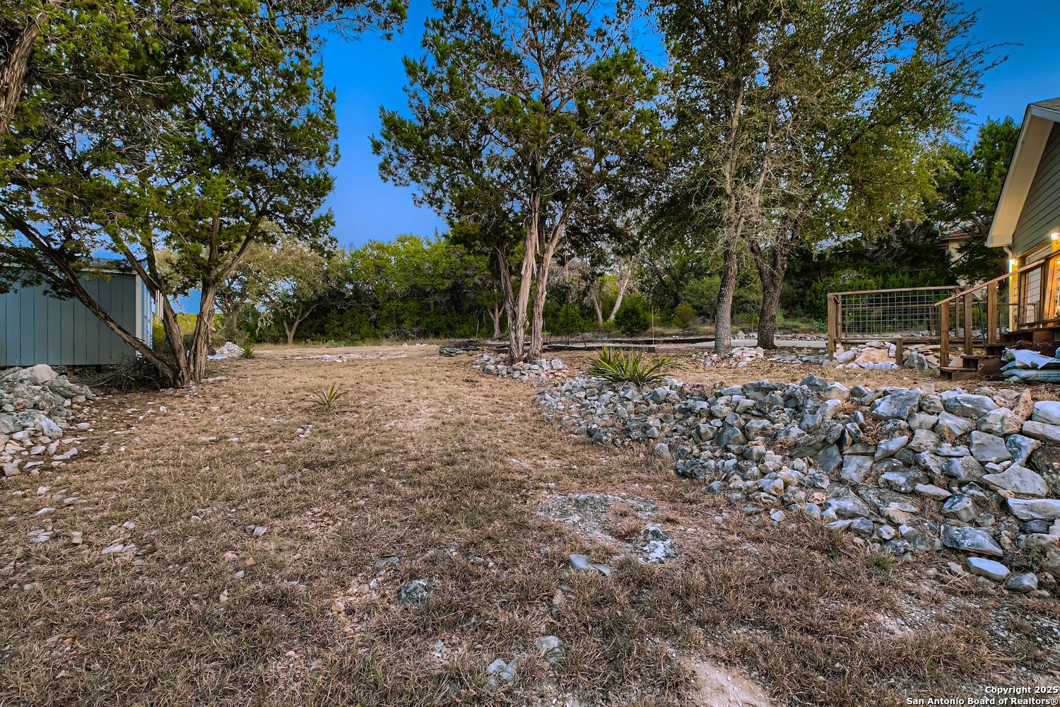3963 Summit Hurst New Braunfels, TX 78132 - Photo 24 of 28 a backyard of a house with lots of green space