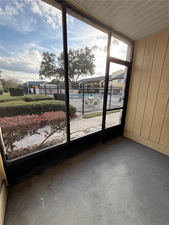 942 Lake Destiny Road, Unit B Altamonte Springs, FL 32714 - Photo 11 of 14 a view of a room with wooden floor and a fireplace