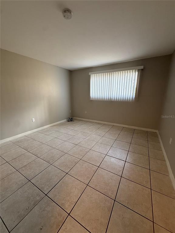 942 Lake Destiny Road, Unit B Altamonte Springs, FL 32714 - Photo 7 of 14 a view of an empty room and window