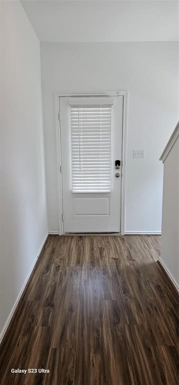 1401 Linwood Street Leander, TX 78641 - Photo 14 of 39 Unfurnished room featuring dark wood-style flooring and baseboards
