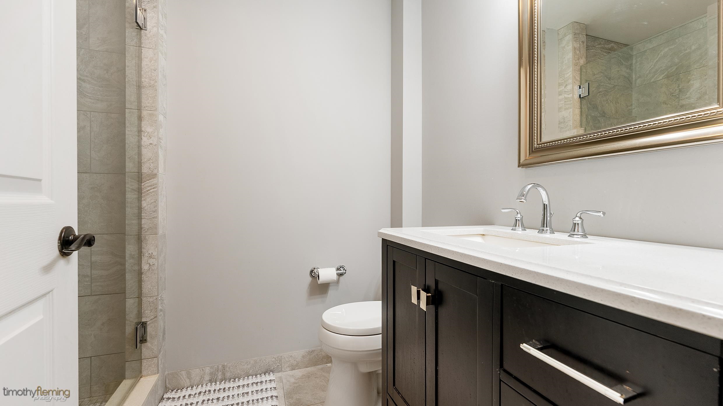 987 Tecumseh Road Erma, NJ 08204 - Photo 23 of 47 a bathroom with a granite countertop sink toilet and mirror