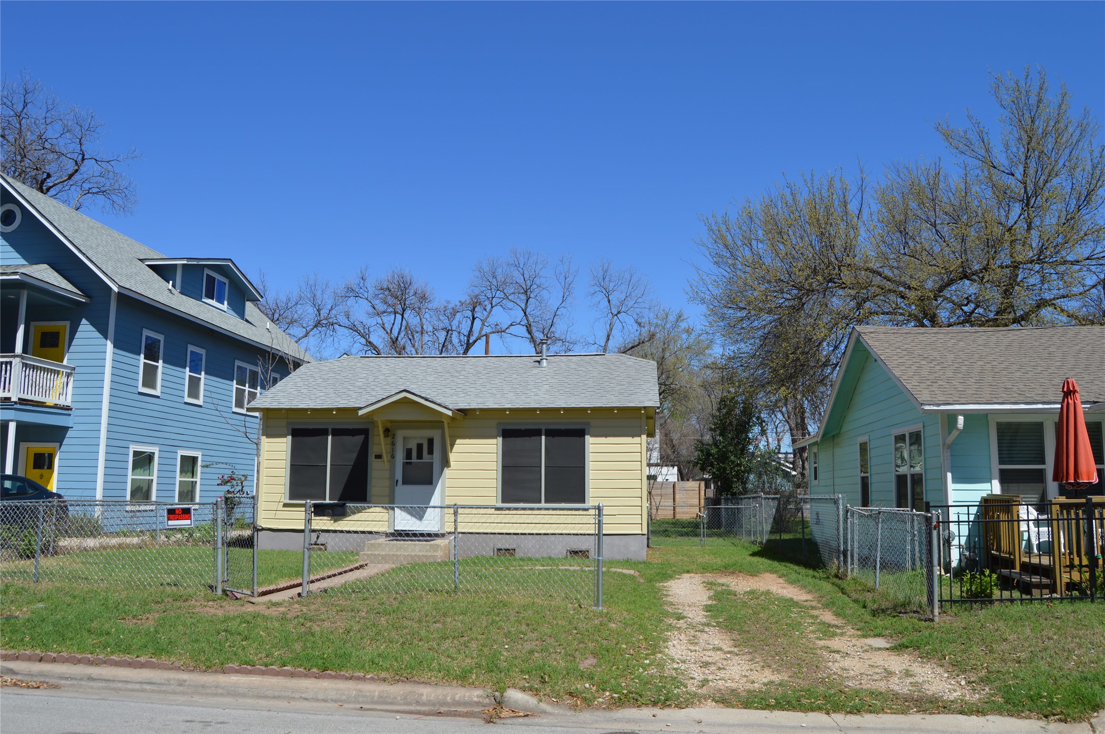 2616 East 3rd Street Austin, TX 78702 - Photo 1 of 11 a front view of a house with garden