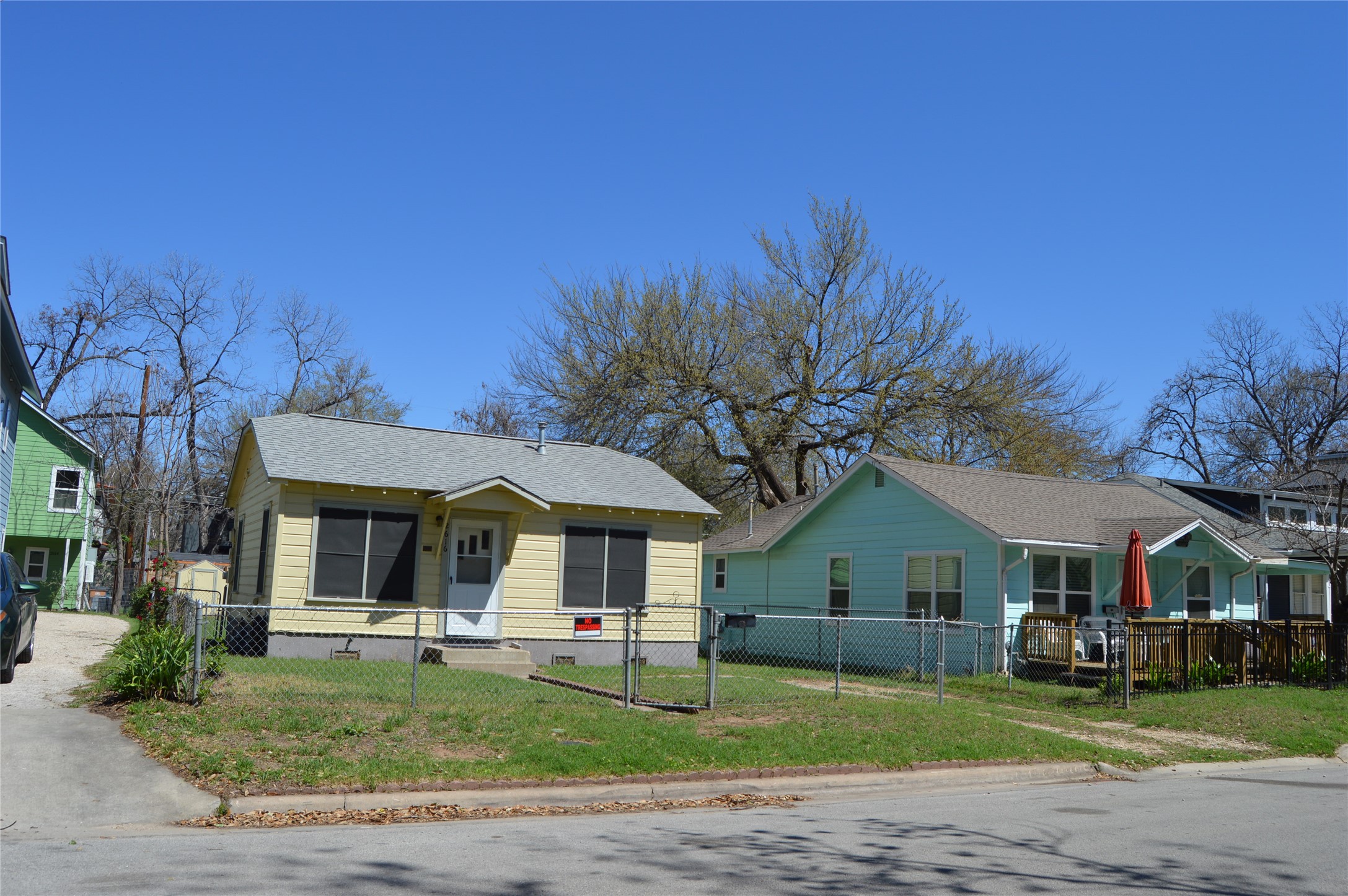 2616 East 3rd Street Austin, TX 78702 - Photo 2 of 11 a front view of a house with a garden and tree