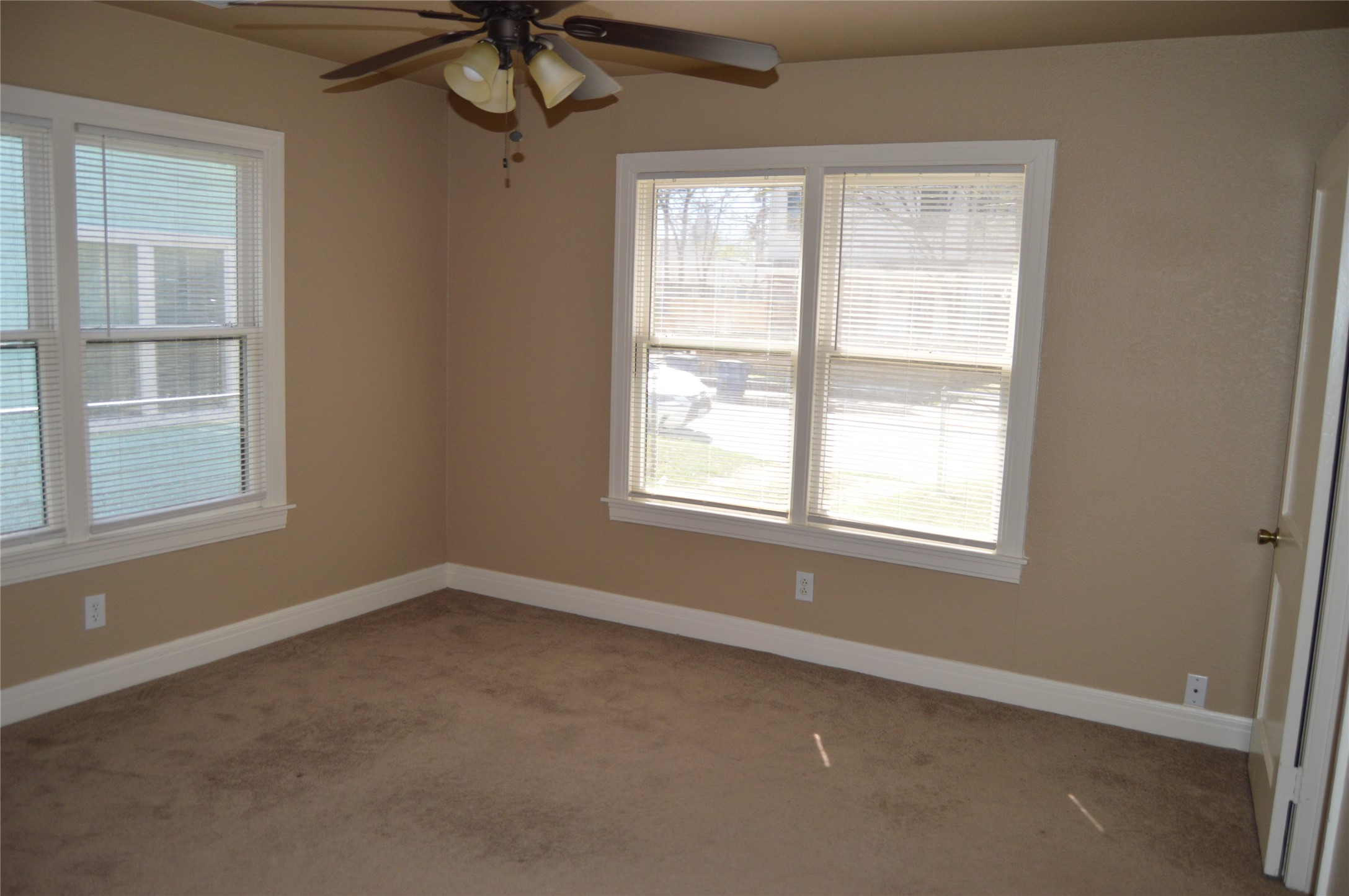 2616 East 3rd Street Austin, TX 78702 - Photo 4 of 11 an empty room with a window