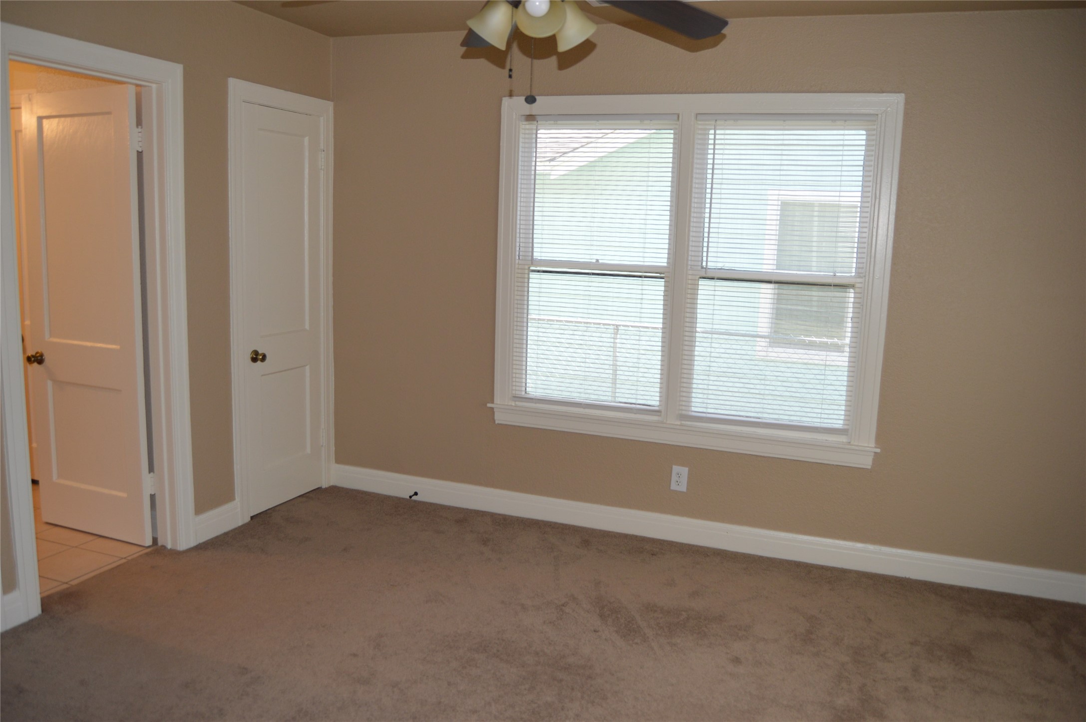 2616 East 3rd Street Austin, TX 78702 - Photo 5 of 11 an empty room with a window