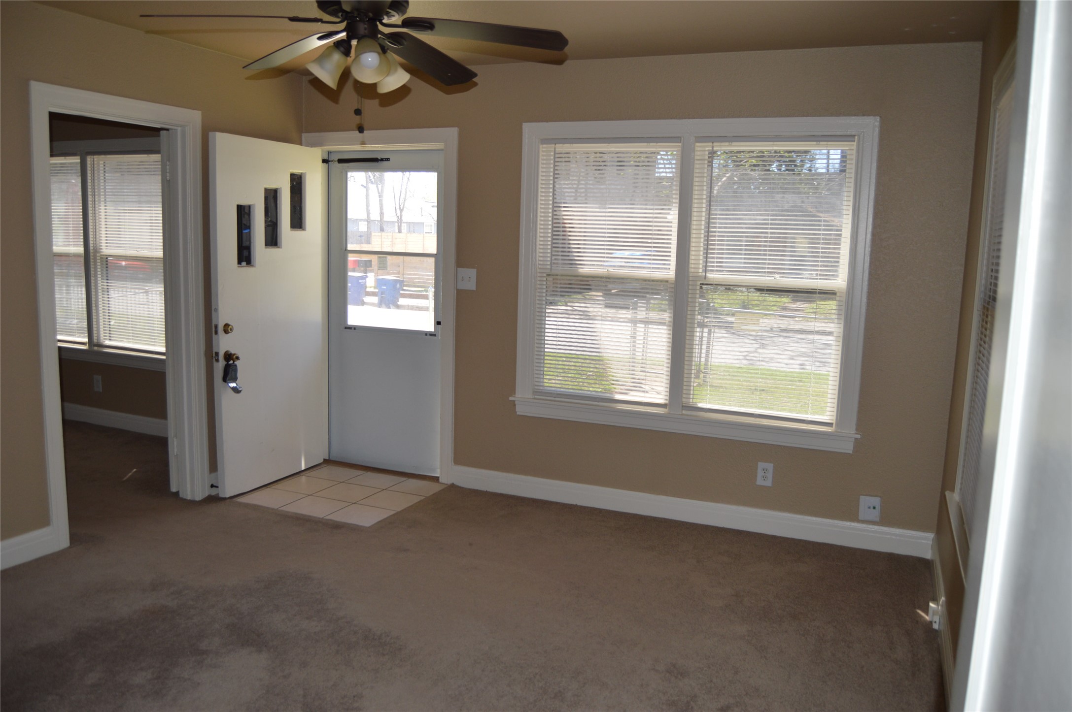 2616 East 3rd Street Austin, TX 78702 - Photo 7 of 11 a view of an empty room with a window