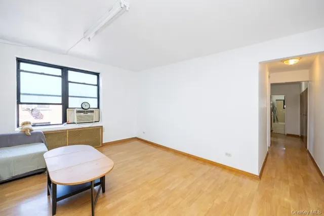 a room with furniture and a window