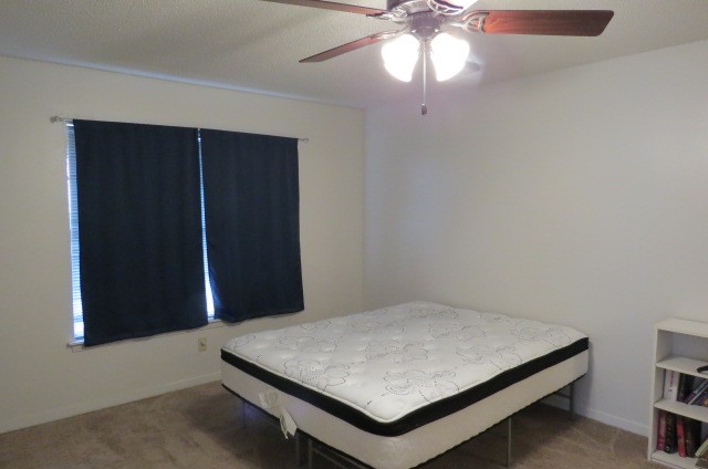 1917 20th Street, Unit 3 Huntsville, TX 77340 - Photo 15 of 18 wooden floor in an empty room