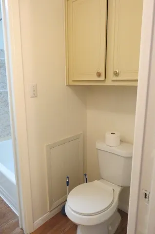 a bathroom with a toilet and a sink