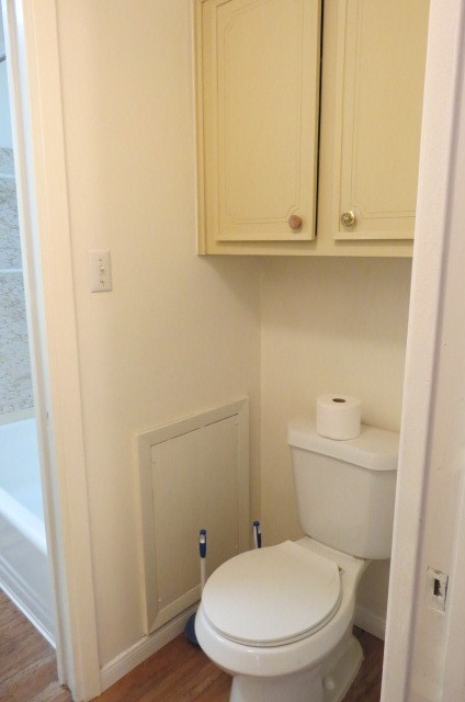 1917 20th Street, Unit 3 Huntsville, TX 77340 - Photo 17 of 18 a bathroom with a toilet and a sink