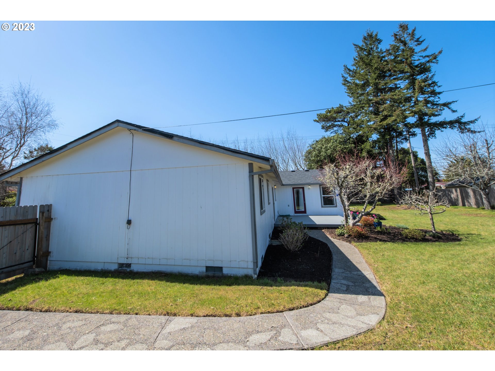 2035 16th Street Florence, OR 97439 - Photo 25 of 30 a view of outdoor space yard and house