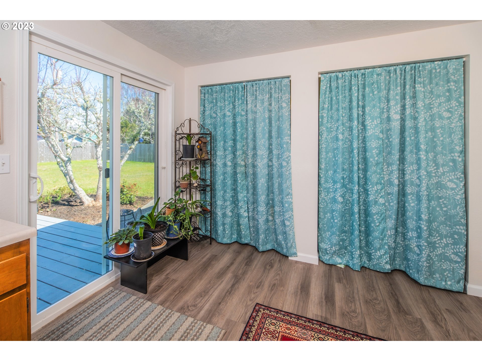 2035 16th Street Florence, OR 97439 - Photo 7 of 30 a view of an entryway with wooden floor