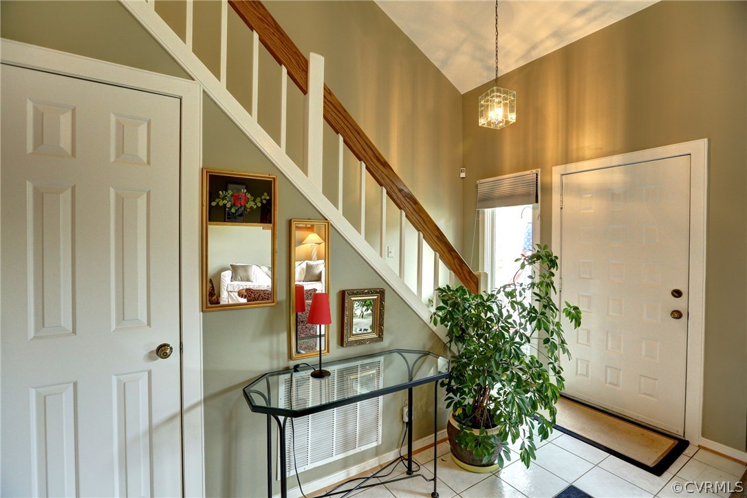 13708 Sandy Oak Road Chester, VA 23831 - Photo 3 of 32 a view of entryway with paintings on the walls