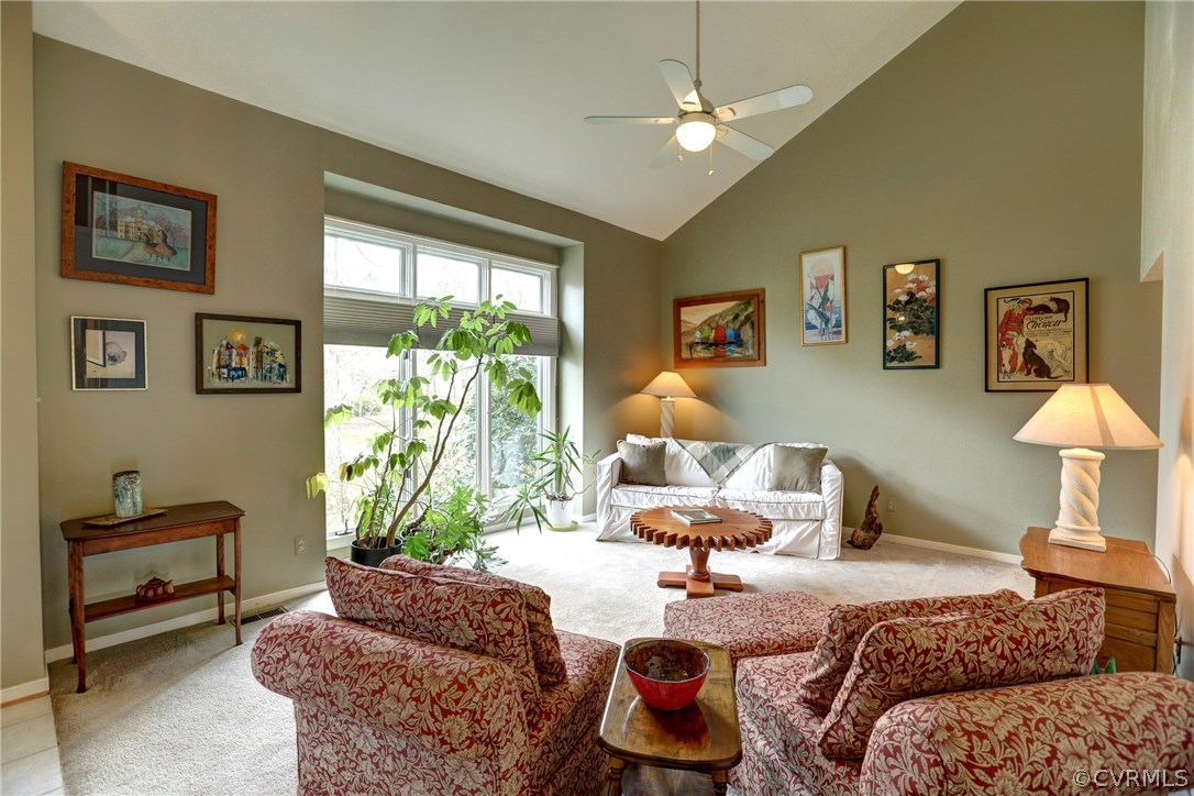 13708 Sandy Oak Road Chester, VA 23831 - Photo 5 of 32 a living room with furniture and a large window