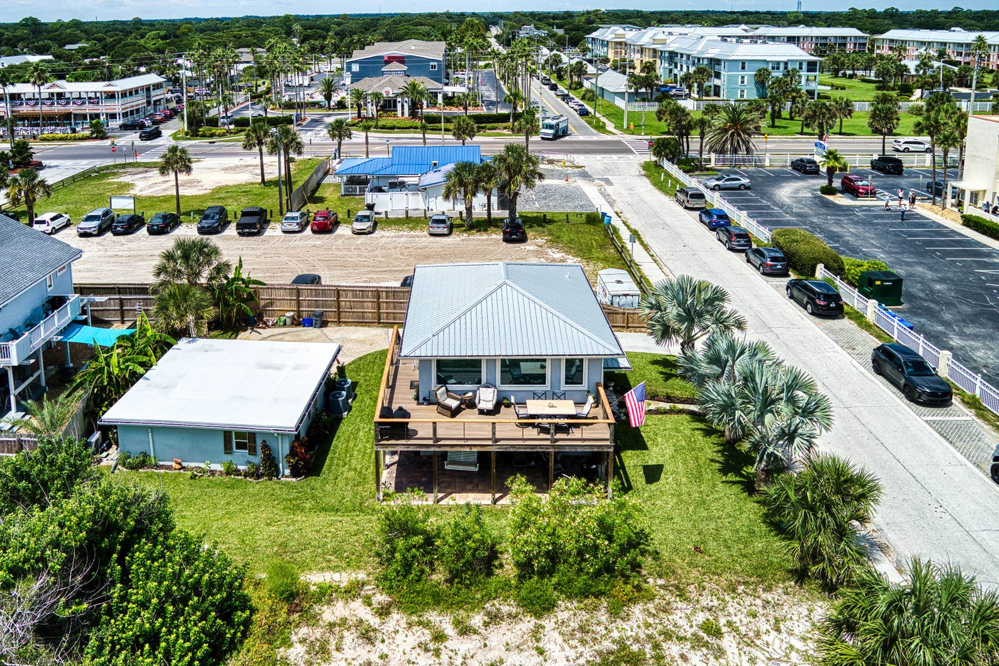 7 16th Street St. Augustine, FL 32080 - Photo 55 of 61 an aerial view of a house with swimming pool tennis courts and lake view