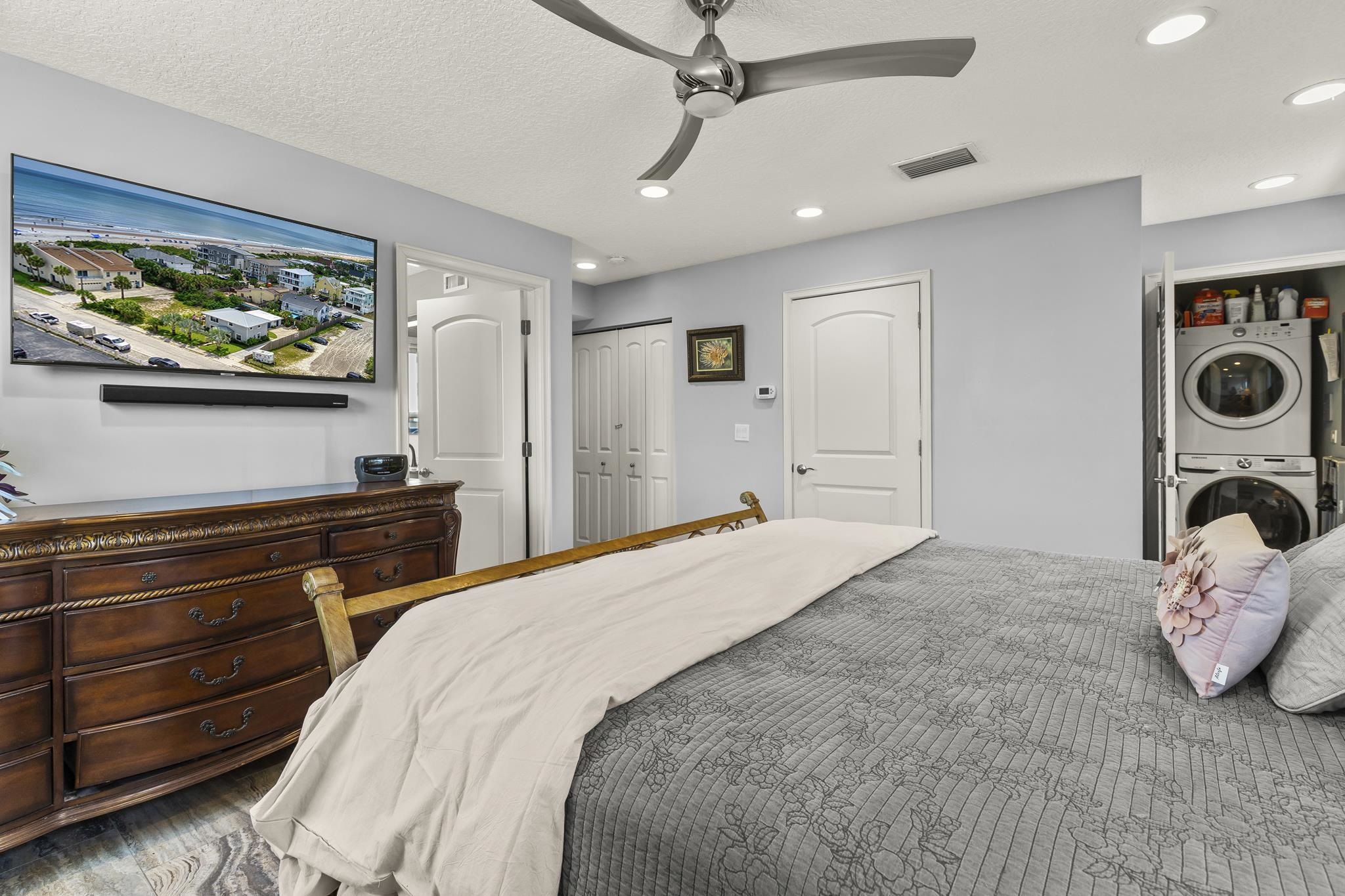 7 16th Street St. Augustine, FL 32080 - Photo 6 of 61 a bedroom with a bed and a flat screen tv