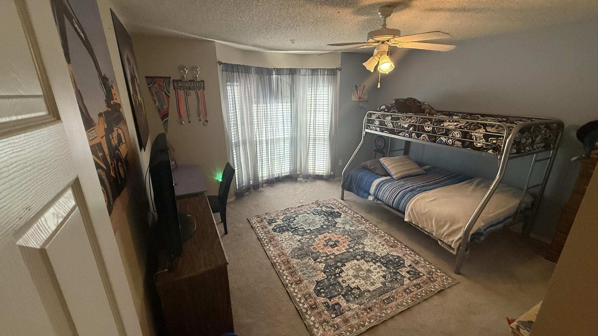 6808 84th Street Lubbock, TX 79424 - Photo 8 of 11 a living room with furniture