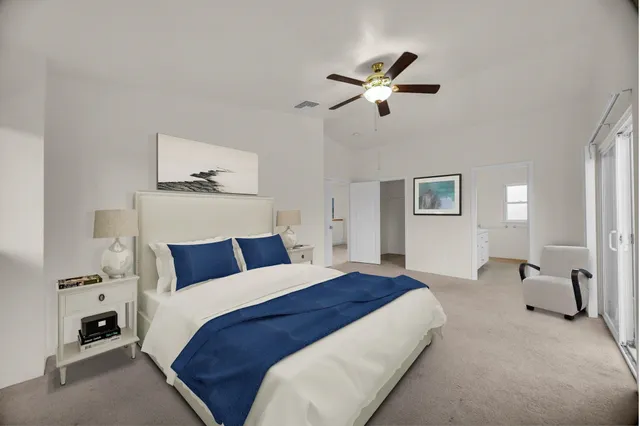 a bedroom with bed and window