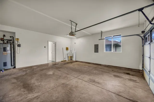 a view of a big room with closet and windows