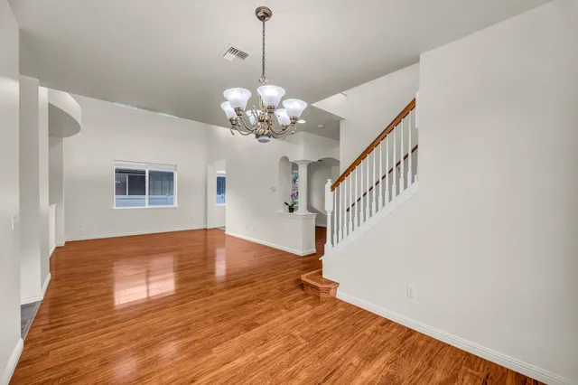 a view of a livingroom with wooden floor