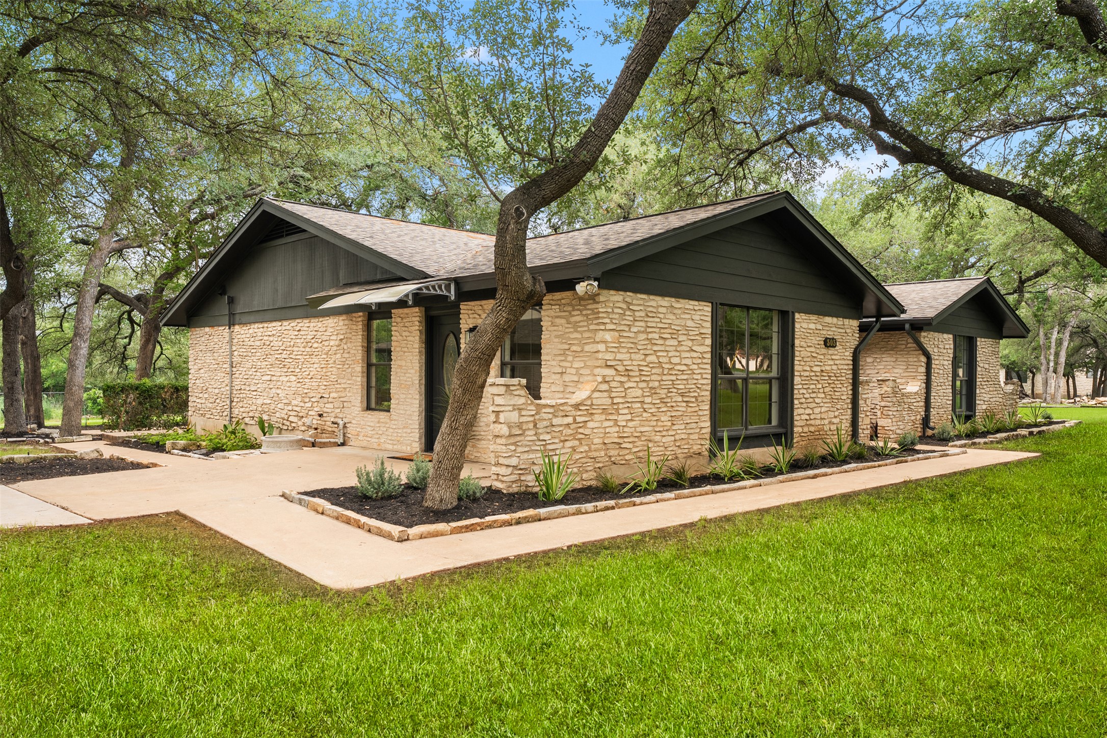 303 West Sequoia Spur Georgetown, TX 78628 - Photo 34 of 34 a view of a house with a yard and tree