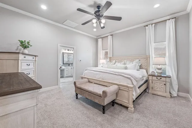 a bedroom with a bed and a cabinets