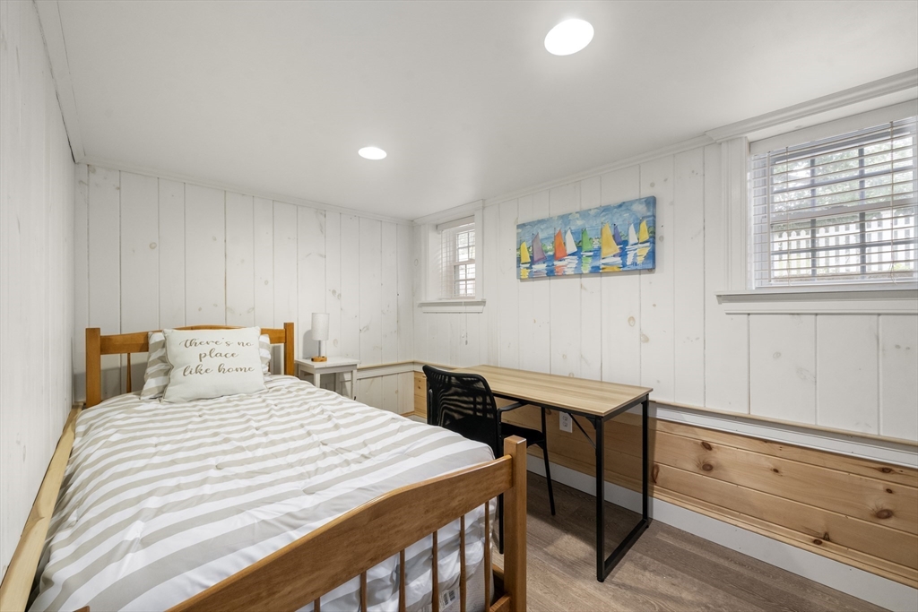 24 Cross Street Harwich, MA 02646 - Photo 23 of 34 a bedroom with a bed and a window