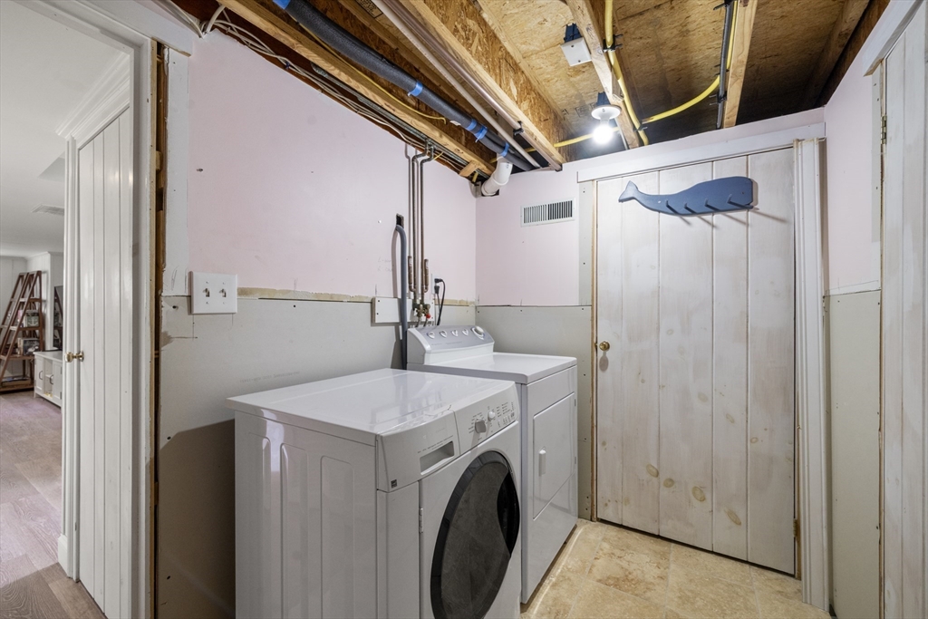 24 Cross Street Harwich, MA 02646 - Photo 25 of 34 a utility room with dryer and washer