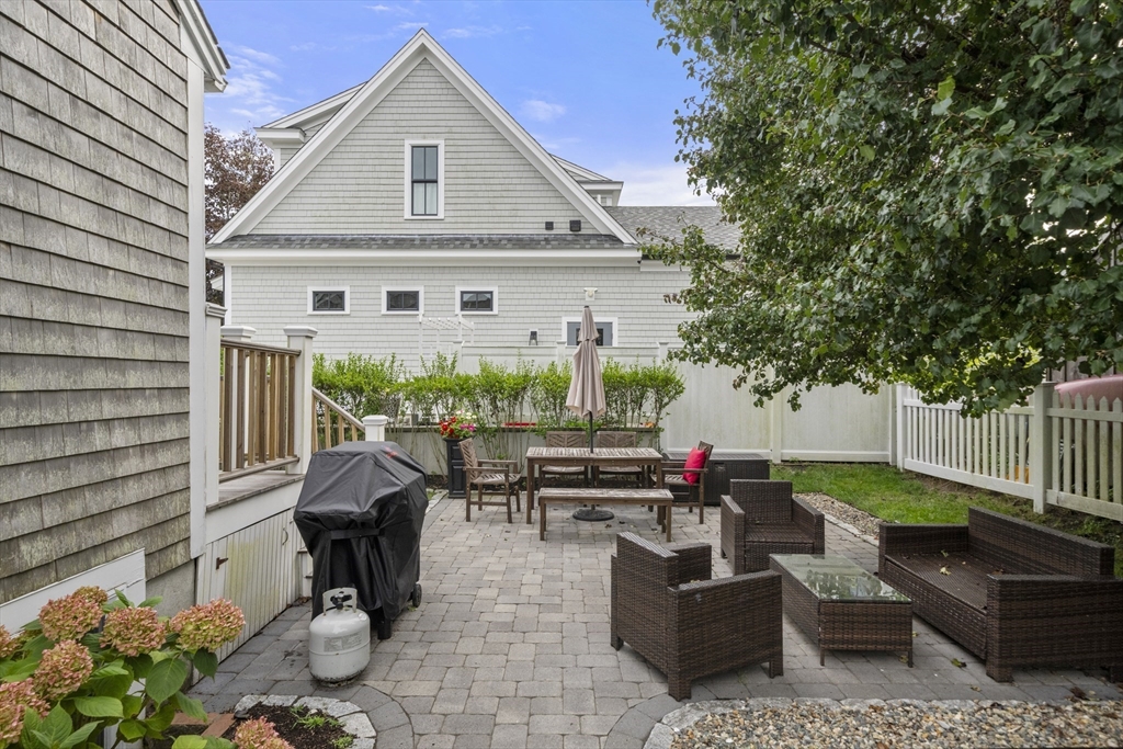 24 Cross Street Harwich, MA 02646 - Photo 29 of 34 a front view of a house with patio