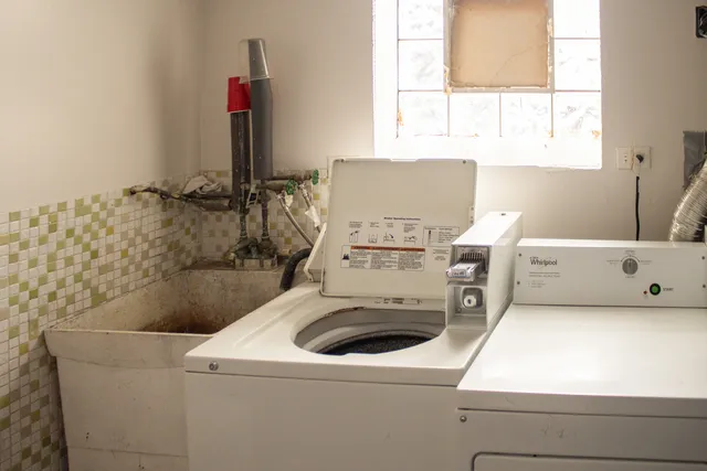a utility room with dryer and washer