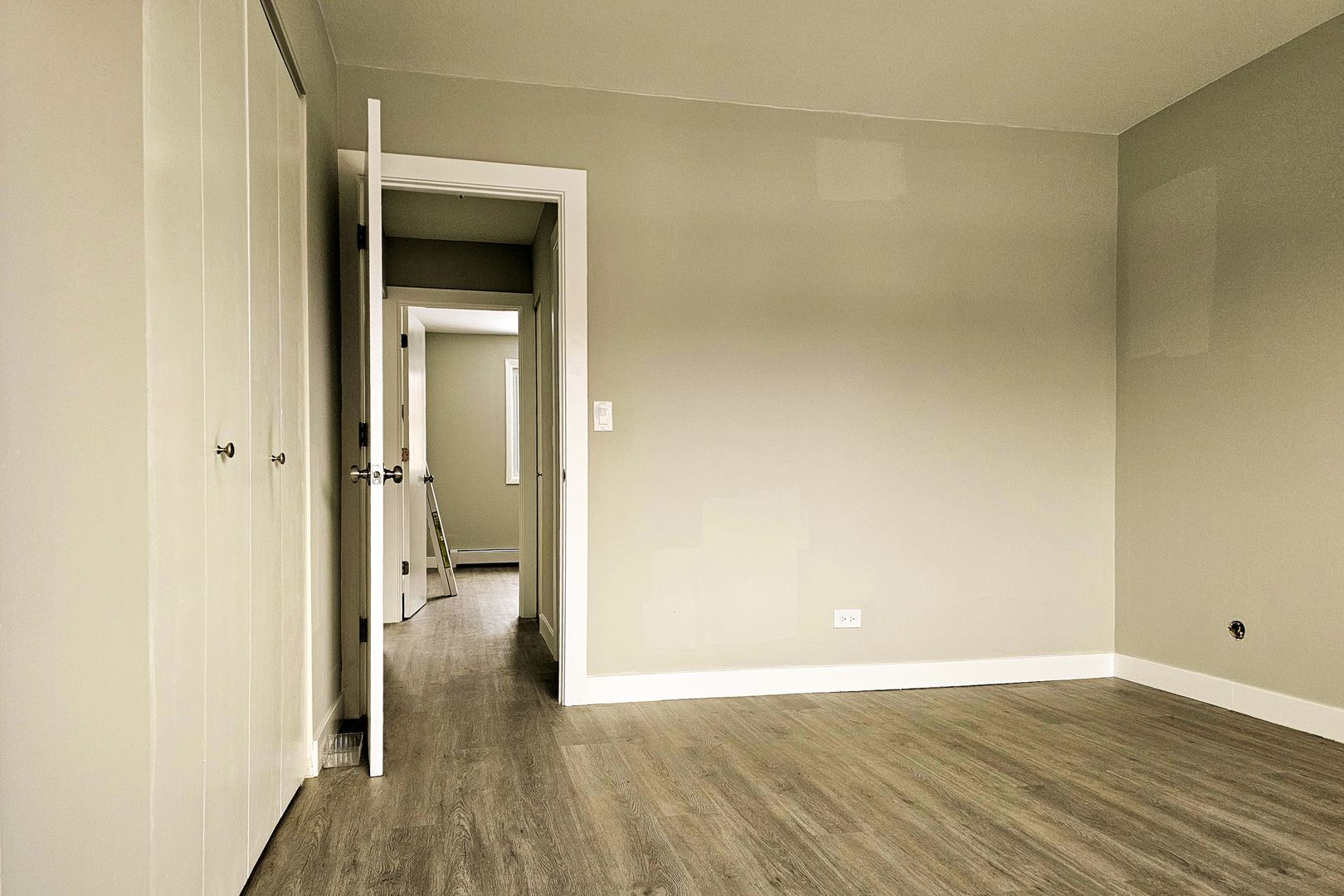 10457 Dearlove Road, Unit 1A Glenview, IL 60025 - Photo 7 of 12 a view of a room with wooden floor