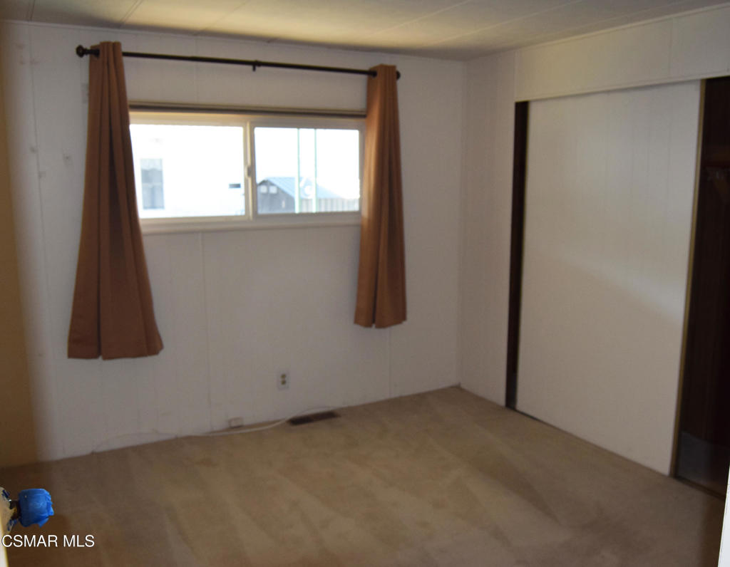195 Tierra Rejada Road, Unit 197 Simi Valley, CA 93065 - Photo 10 of 28 a view of a room that has a window in it