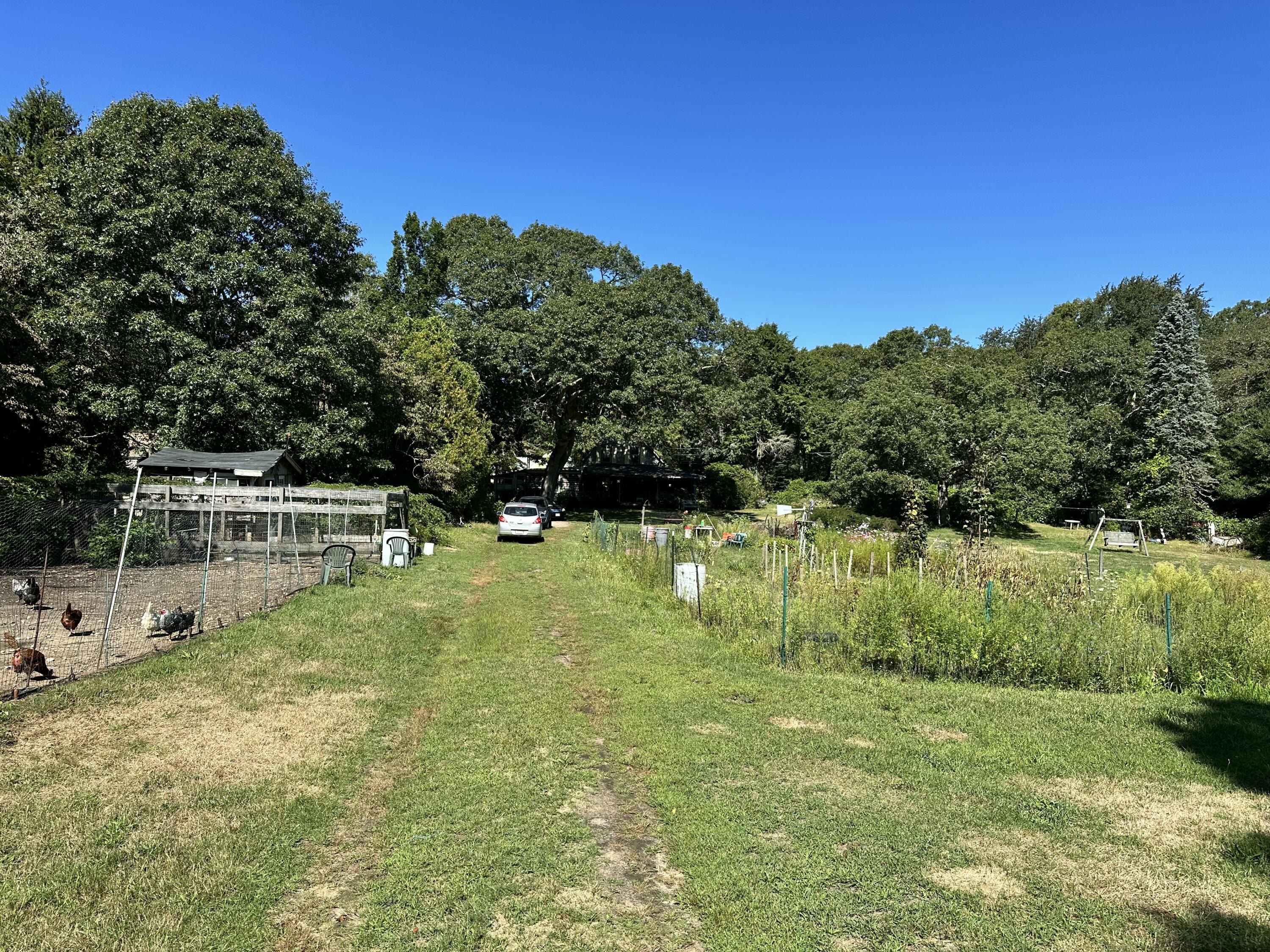 1044 Old Falmouth Road Centerville, MA 02632 - Photo 23 of 27 parking and chicken coop
