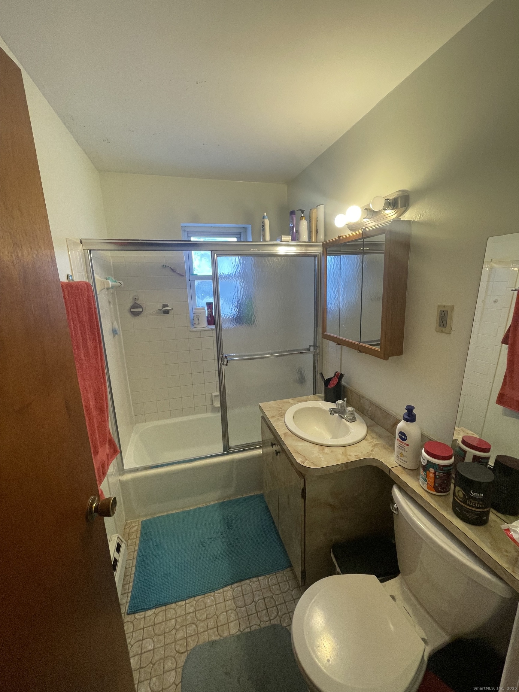 24 Merrill Street, Unit C4 Hartford, CT 06106 - Photo 9 of 11 a bathroom with a sink toilet and shower