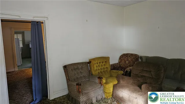 a view of a door and utility room