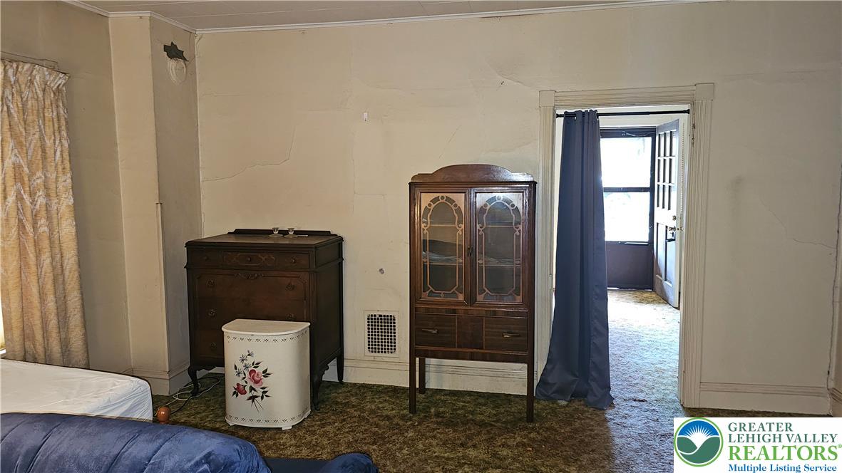 415 Stoneman Street Bethlehem, PA 18015 - Photo 12 of 45 a bathroom with a toilet and a shower
