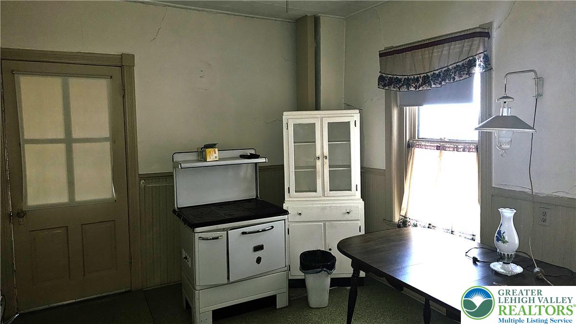 415 Stoneman Street Bethlehem, PA 18015 - Photo 17 of 45 a kitchen with a sink cabinets and window