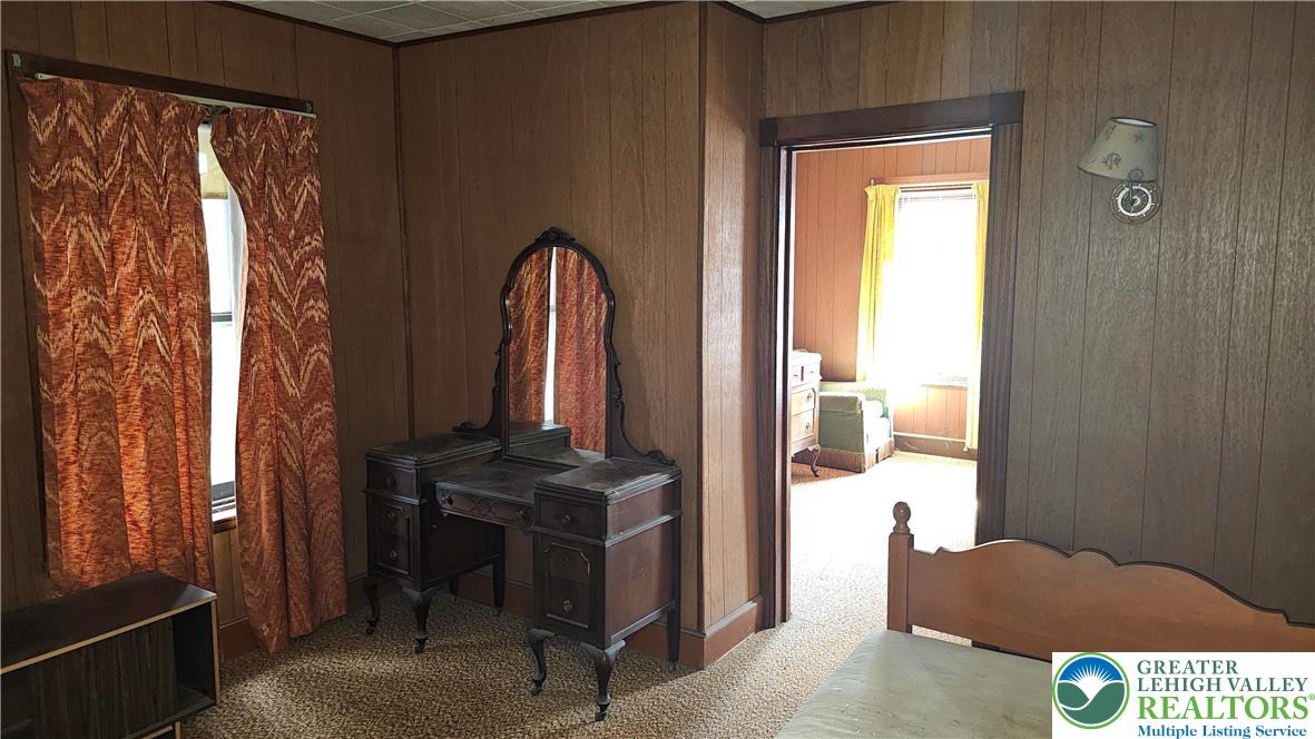 415 Stoneman Street Bethlehem, PA 18015 - Photo 23 of 45 a view of living room with furniture and a window