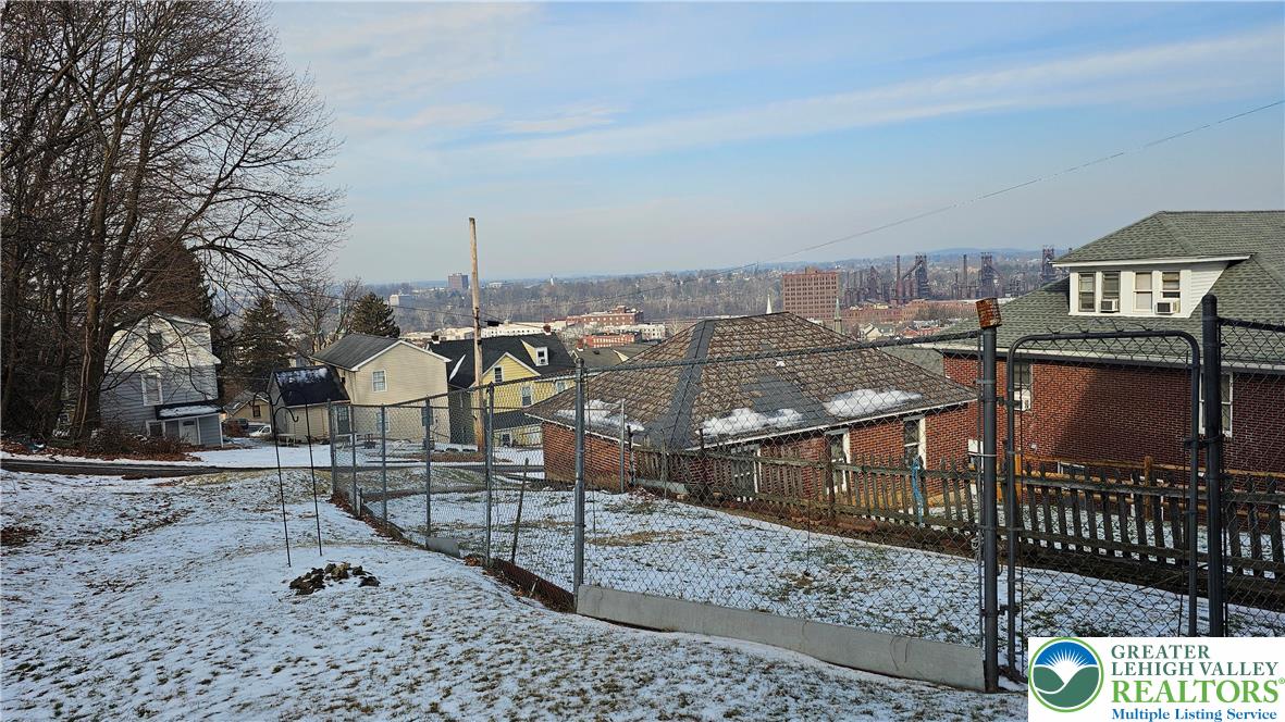415 Stoneman Street Bethlehem, PA 18015 - Photo 7 of 45 a view of a terrace with wooden fence