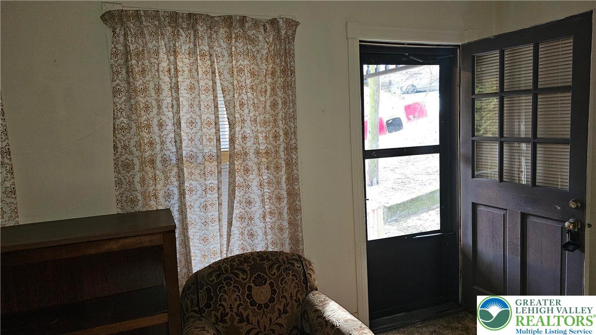 415 Stoneman Street Bethlehem, PA 18015 - Photo 8 of 45 a bedroom with a bed and a window