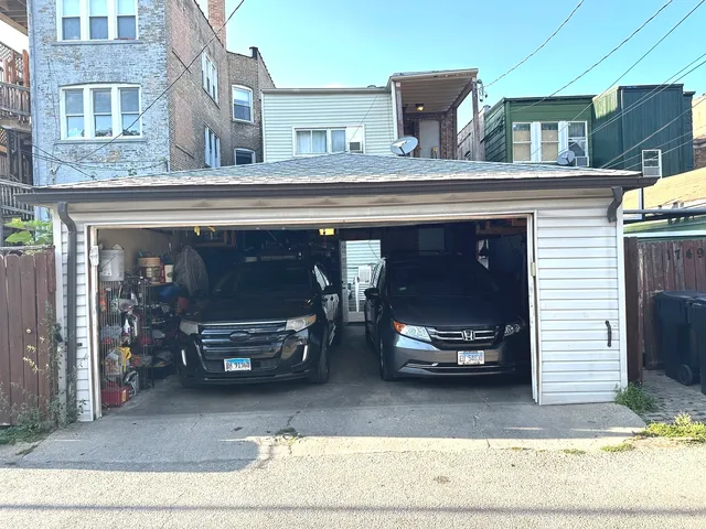 a view of a car park of the house