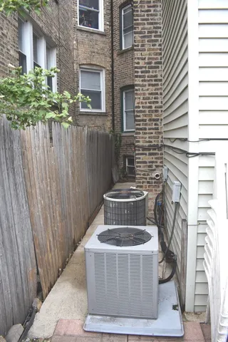 a kitchen with stainless steel appliances a stove a sink and a refrigerator