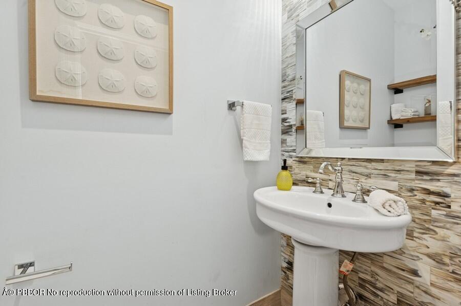 310 Almeria Road West Palm Beach, FL 33405 - Photo 32 of 71 32_310AlmeriaRd_199_PowderRoom_Small