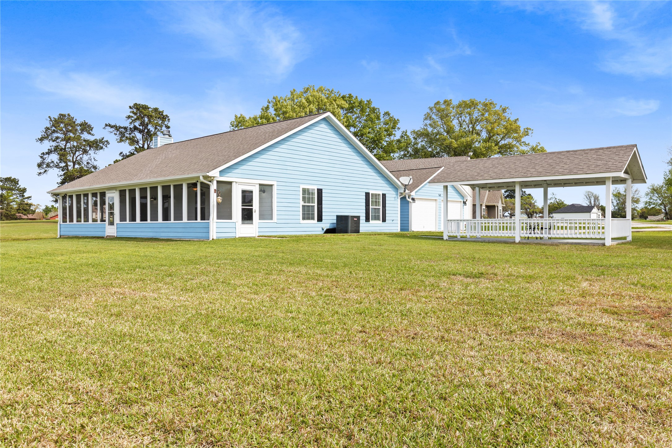 140 Meadowview Drive Trinity, TX 75862 - Photo 2 of 27 a view of a house with a yard and sitting area