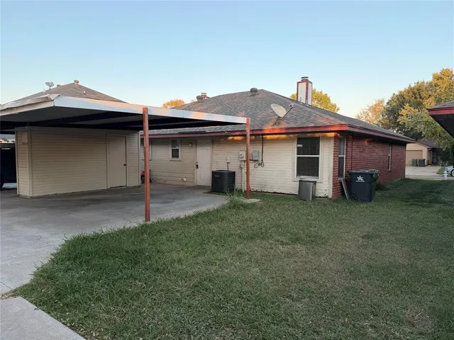 a house view with a garden space