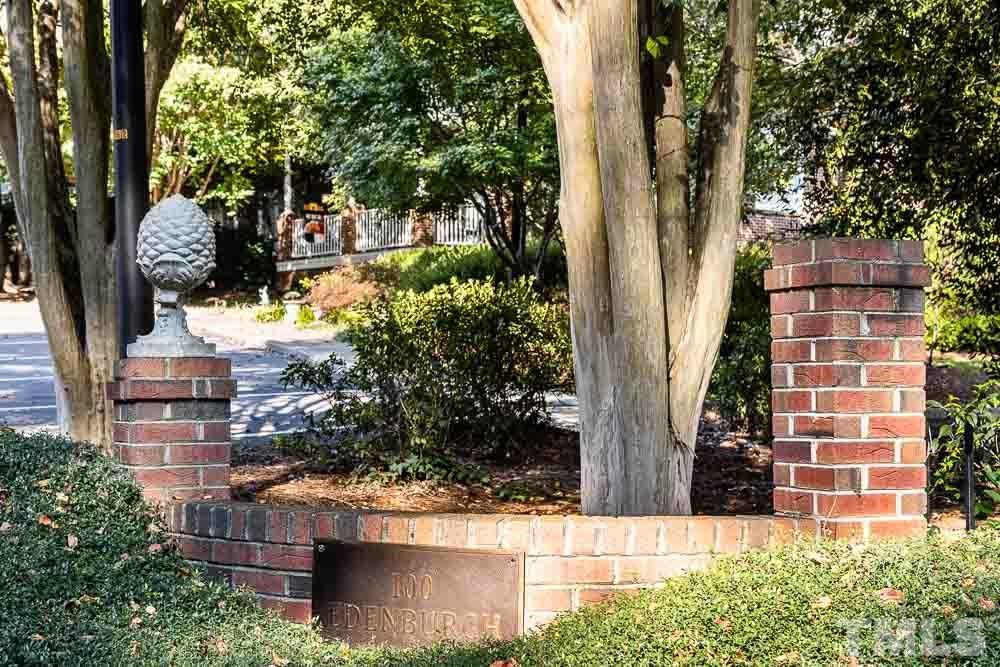 100 Edenburgh Road, Unit 203 Raleigh, NC 27608 - Photo 1 of 26 a view of balcony with plants and palm trees