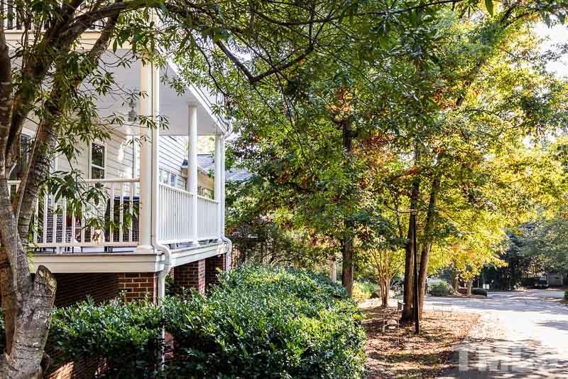 100 Edenburgh Road, Unit 203 Raleigh, NC 27608 - Photo 2 of 26 a view of a building with a tree