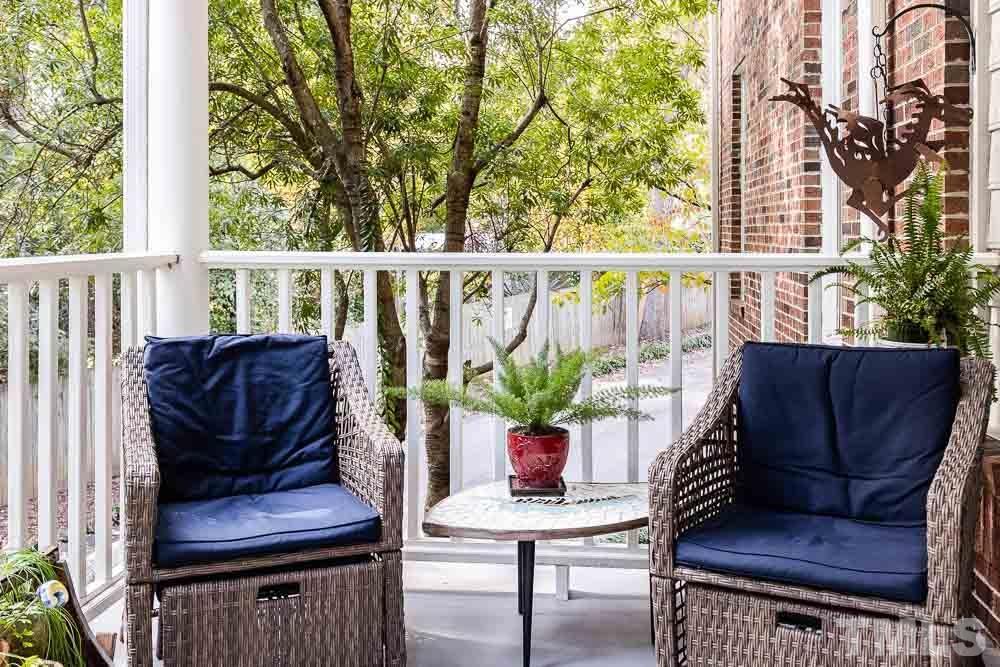 100 Edenburgh Road, Unit 203 Raleigh, NC 27608 - Photo 15 of 26 a view of a two chairs in the deck